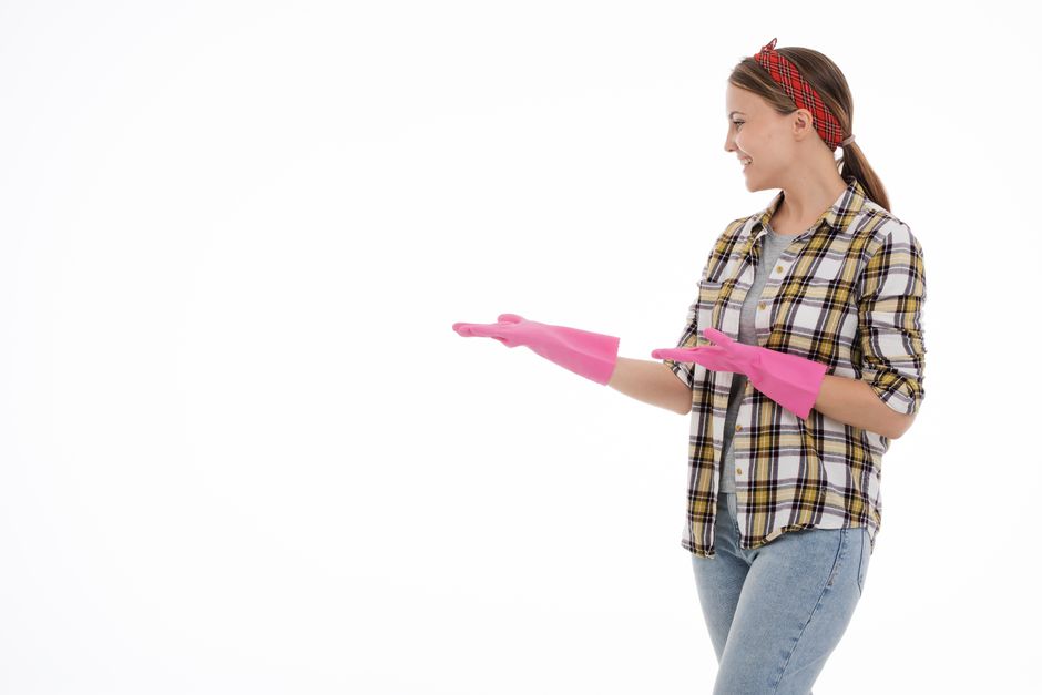 Professional carpet cleaner operating modern, low-moisture equipment