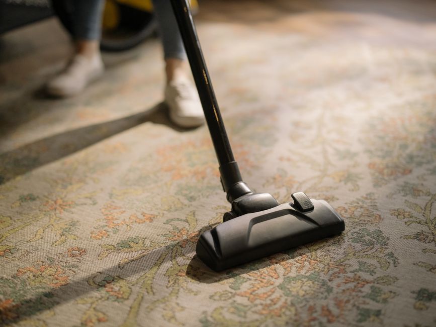 Close-up of advanced carpet cleaning machine in action