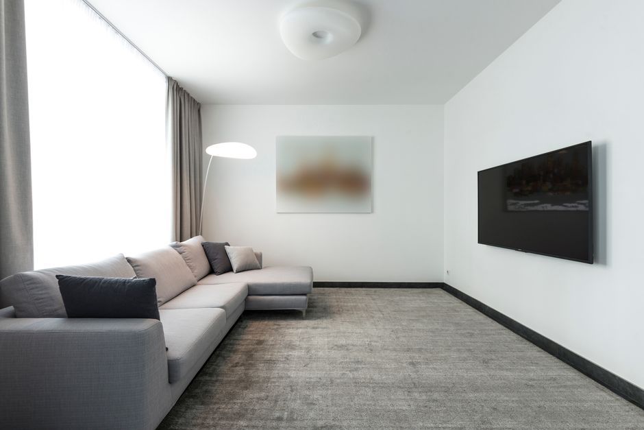Pristine living room showing freshly cleaned carpet and upholstery